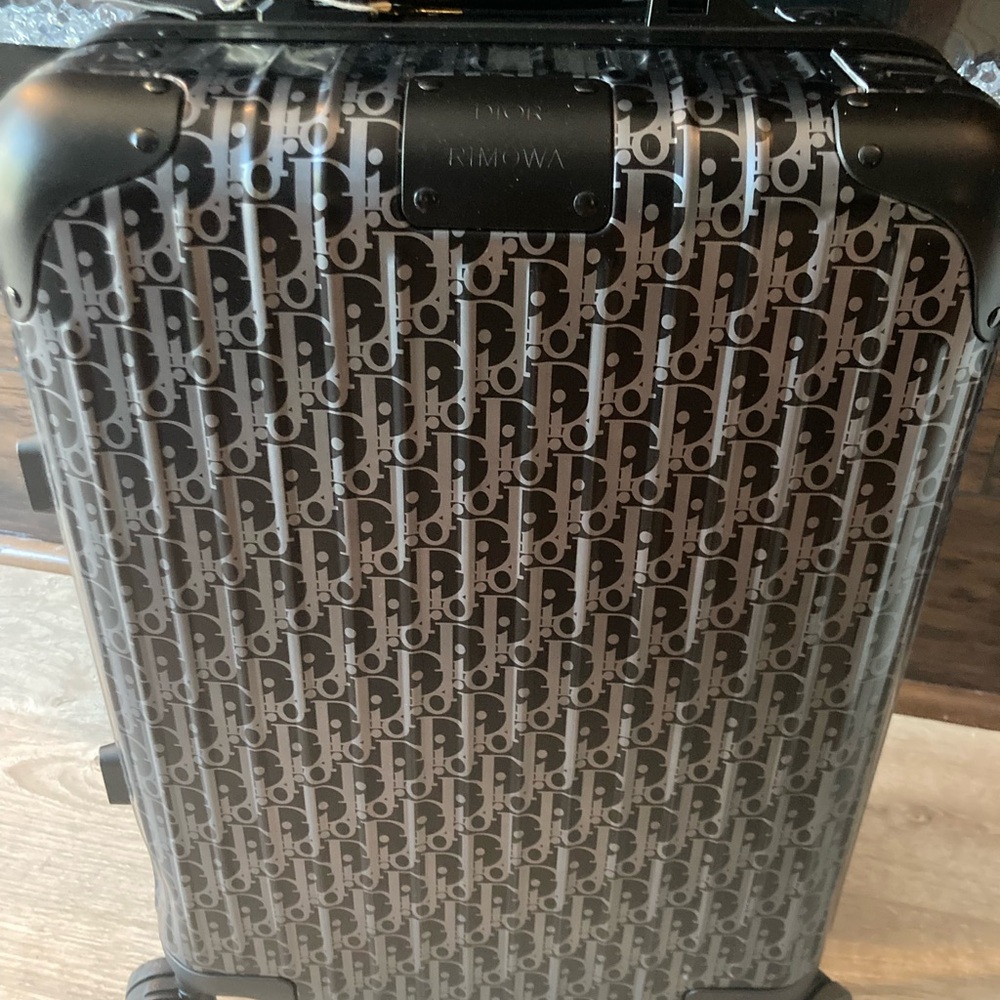 Authentic RIMOWA x DIOR luggage for carry on.